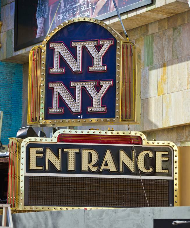 The New York - New York Hotel & Casino  marquee entrance sign is taken down by Yesco and donated to the Neon Museum on Tuesday, Jan. 7, 2014.